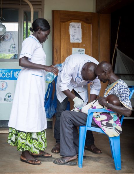 Health staff treat a child at clinic in South Sudan